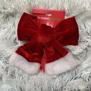 Celebrate Together oversized red velvet bow hair clip with white trim